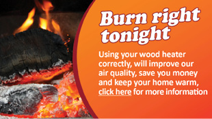 Small advertisement shows an image of burning logs in a fireplace with the text “Burn right tonight: Using your wood heater correctly, will improve our air quality, save you money and keep your home warm, click here for more information.”