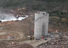 Construction of the Hydro Generator and an impression of the completed Jounama hydro project. Photos: Tumut Shire Council