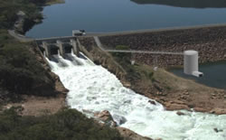 Construction of the Hydro Generator and an impression of the completed Jounama hydro project. Photos: Tumut Shire Council